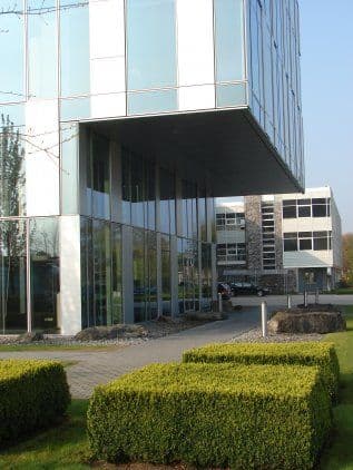Inkomruimte en hardsteenaccenten in Duffel